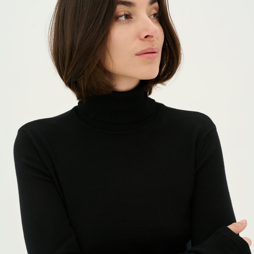 
                      
                        Annemarie Rollneck Black
                      
                    