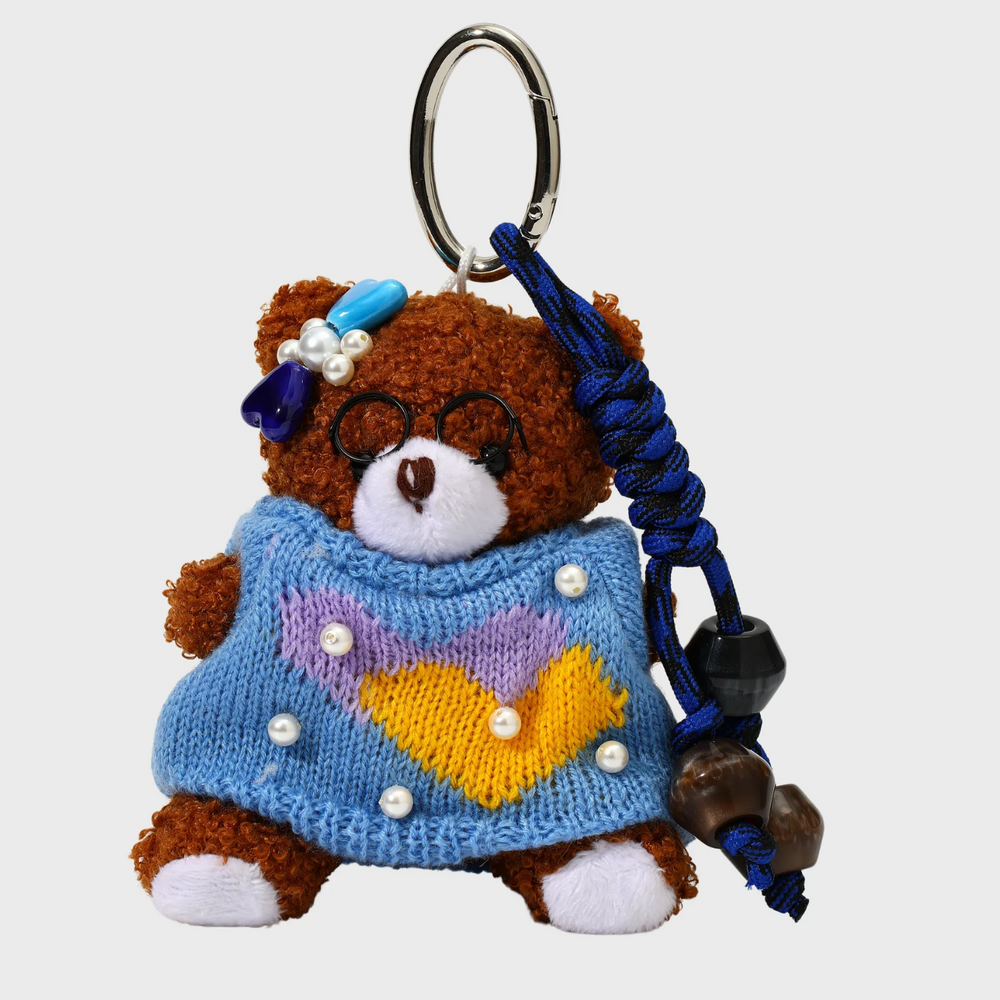 Teddybear w knitted blue sweater